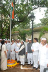 NCP MAHARASHTRA STATE PRESIDENT MADHUKARRAO PICHAD HOSTING FLAG ON INDEPENDENCE DAY AT RASHTRAVADI BHAVAN.