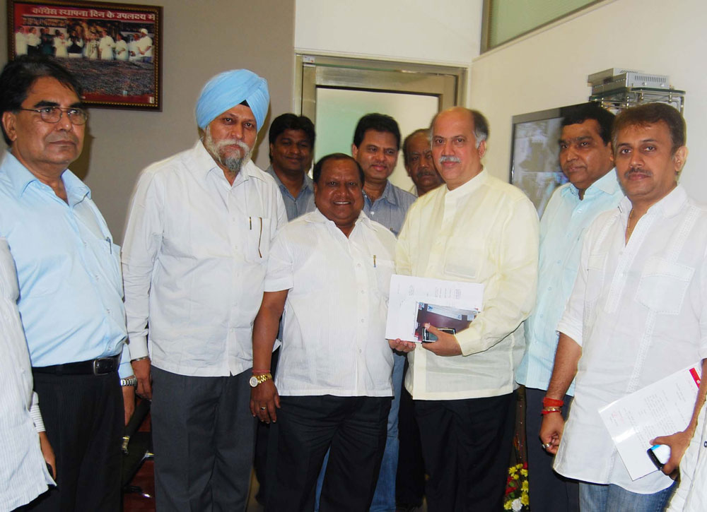 UNION MINSTER OF STATE HOME & TELE COMMUNICATIONS AND IT SHRI.GURUDAS KAMAT AT ANDHERI D.N.NAGAR OFFICE.