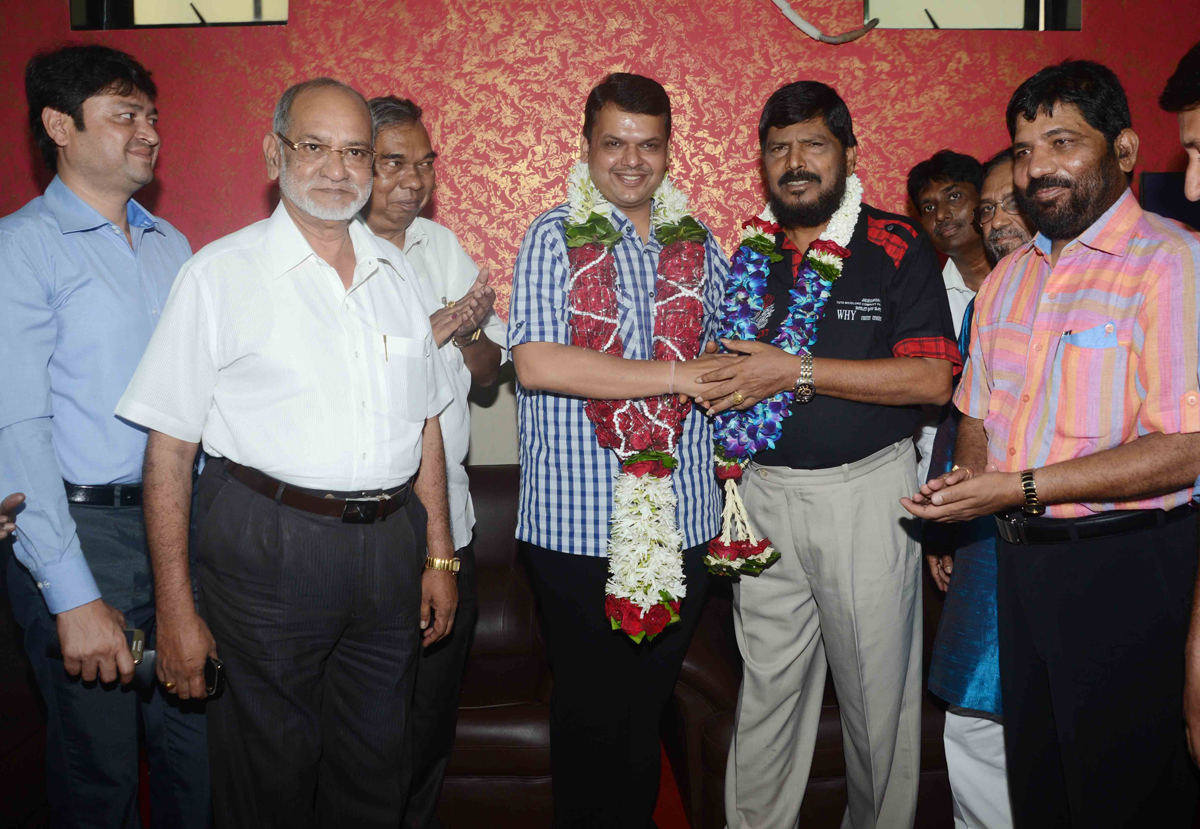 NEWLY BJP MAHARASHTRA STATE PRESIDENT DEVENDRA PHADNAVIS MEETS RPI PRESIDENT RAMDAS ATHAWALE AT SAVIDHAN BUNGLOW BANDRA.