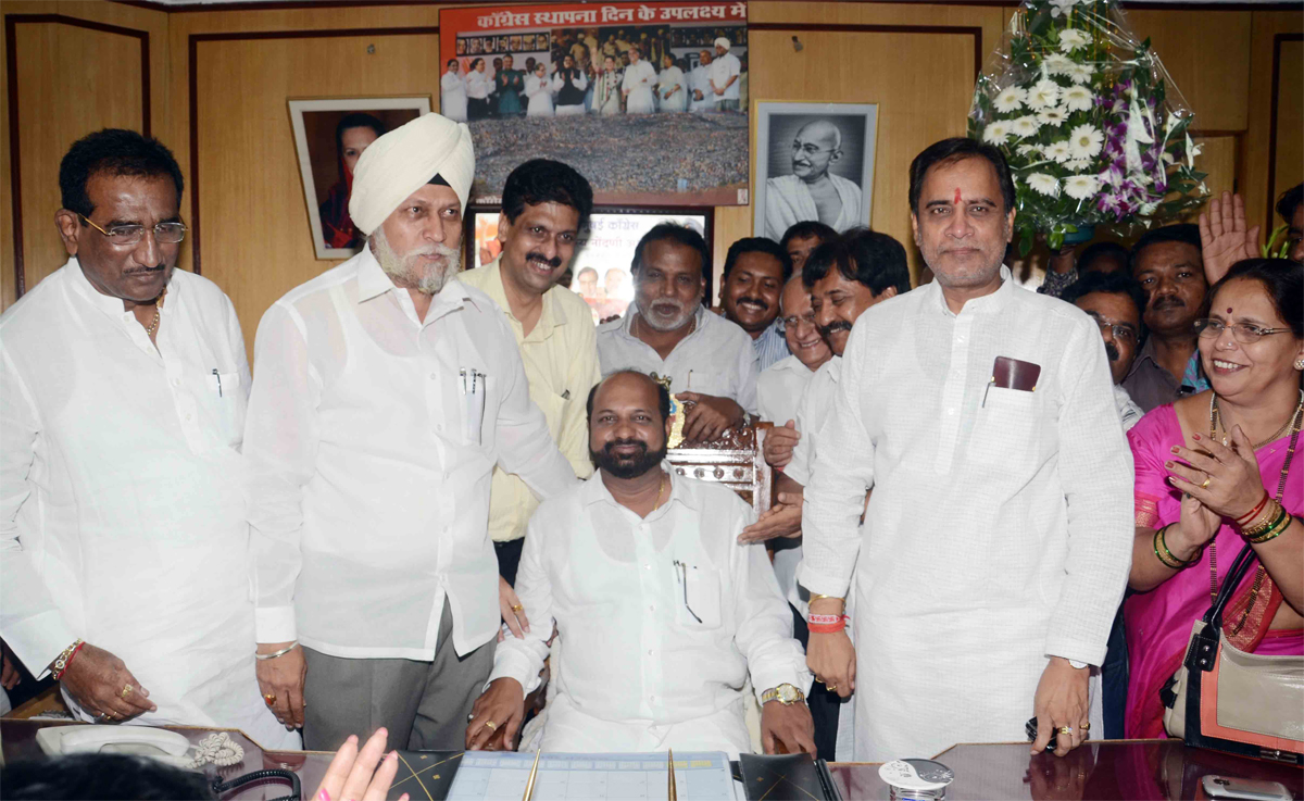 MUMBAI CONGRESS PARTY NEWLY APPOINTED BMC OPPOSITION LEADER DEVENDRA (BALA) AMBEKAR TOOK HIS CHARGE TODAY AT BMC HEAD OFFICE MUMBAI CST.