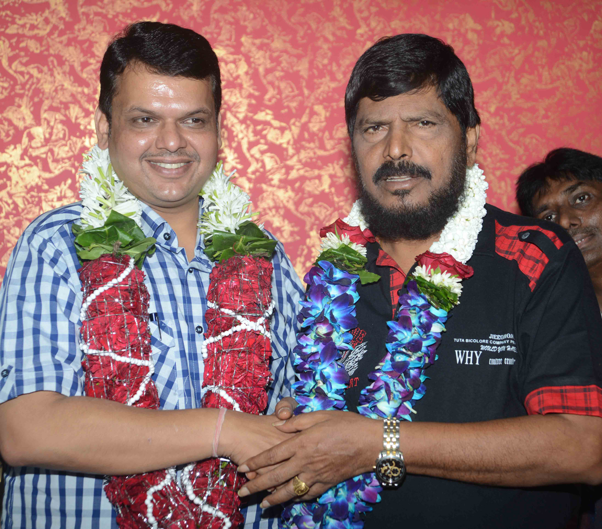 NEWLY BJP MAHARASHTRA STATE PRESIDENT DEVENDRA PHADNAVIS MEETS RPI PRESIDENT RAMDAS ATHAWALE AT SAVIDHAN BUNGLOW BANDRA.