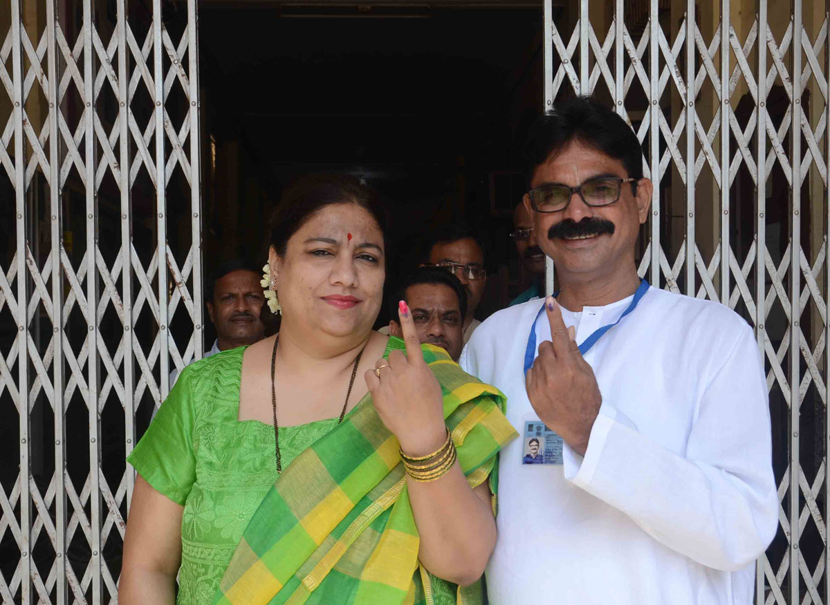 MNS MP.Candidate Bala Nandgaokar along with his wife at Voting centre in Mazagaon.