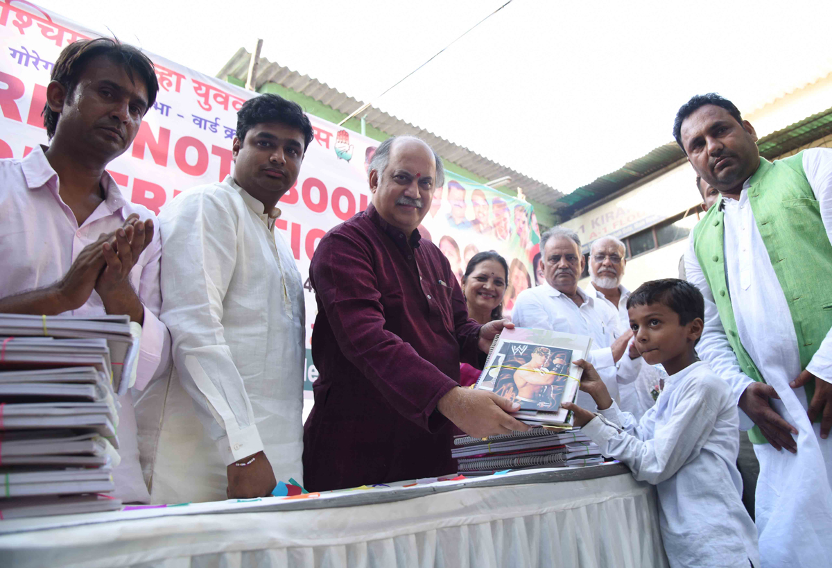 Former MP,AICC Gen.Sec.Member CWC Gurudas Kamat for Free Note Book Distribution at Malad,Youth Convention & Office opening at Andheri.
