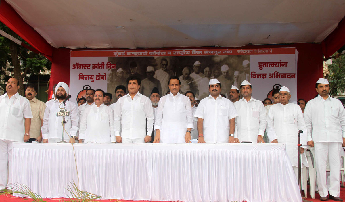 NCP LEADER'S PAYING TRIBUTE TO "KRANTI STAMBHA" ON THE OCCASION "KRANTI DIN" AT GOWALIA TANK MAIDAN IN MUMBAI.