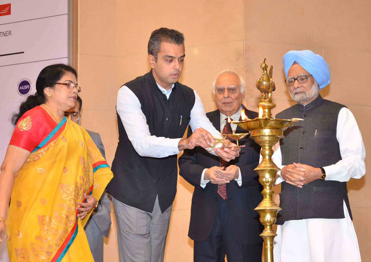 The Prime Minister Dr. Manmohan Singh,Union Minister For Communications & Information Technology and Law & Justice Kapil Sibal and The Minister Of State For Communications & Information Technology and Shipping,Shri Milind Deora At New Delhi.