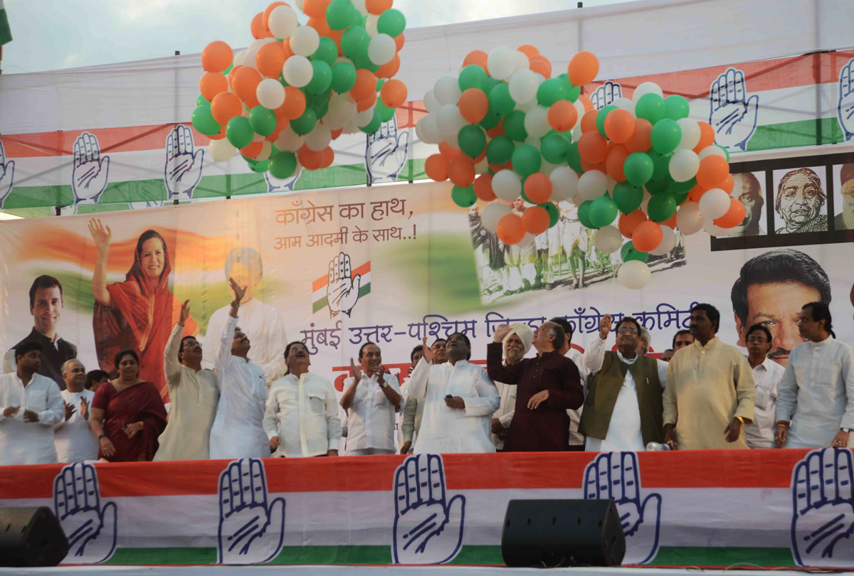 CHIEF MINISTER PRITHVIRAJ CHAVAN,MUMBAI CONGRESS PRESIDENT JANARDHAN CHANDURKAR ,MP & EX. UNION MINISTER GURUDAS KAMAT DURING MUMBAI NORTH WEST DISTRICT CONGRESS COMMITTEE CONGRESS WORKERS SAMMELAN AT ANDHERI SPORTS COMPLEX.