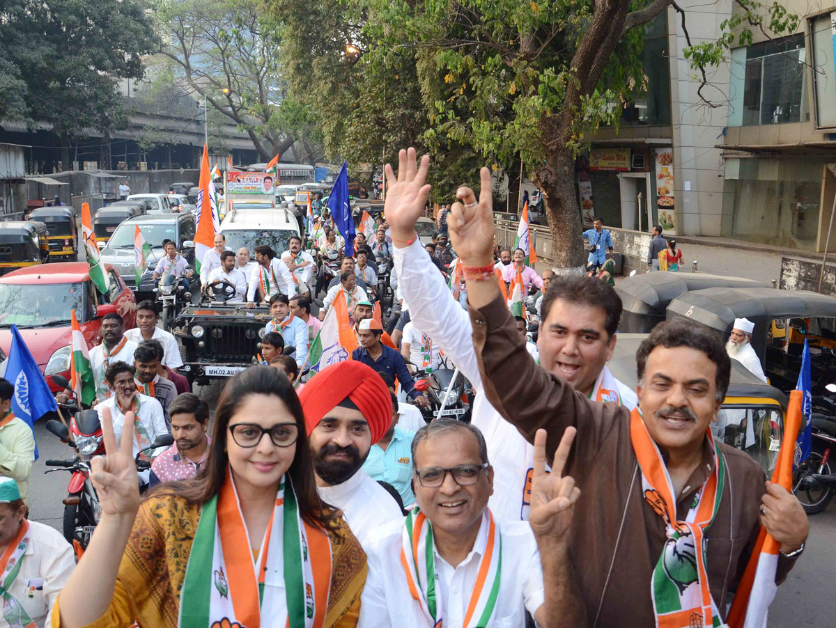 MRCC President Sanjay Nirupam & Cine Star Nagma during Election Campaign Rally at Mulind in Mumbai.