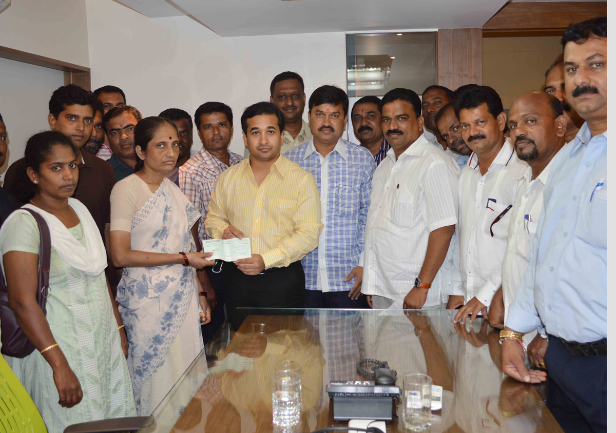 SWABHIMAAN SANGHTNA PRESIDENT NITESH NARAYANRAO RANE .