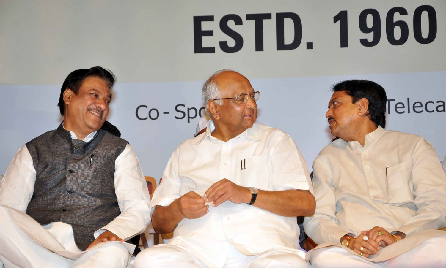 TOP LEADERS ON A PLATFORM IN A PROGRAM  AT HOTEL TAJ LAND END BANDRA .