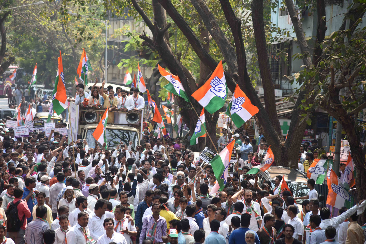 Mumbai Congress President Sanjay Nirupam with Party Workers Protest against BJP Minister Vinod Tawade at his Vile Parle Residence.