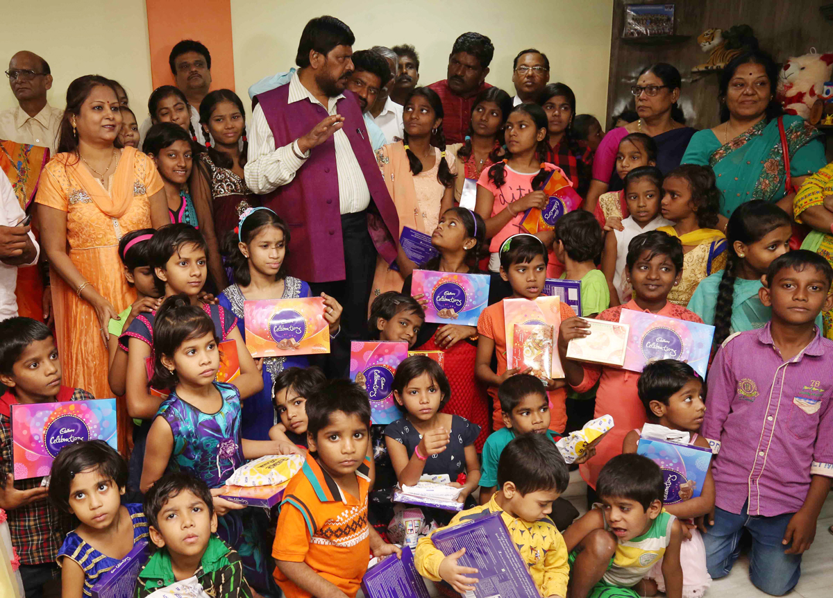 Social Justice Minister Ramdas Athawale MOS celebrating Diwali wiyh Orphans Children by distributing Sweets,Fire Crackers at Goregaon.