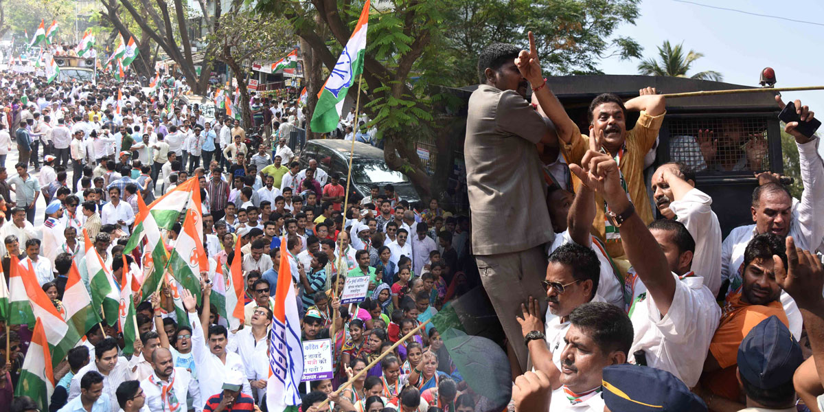 Mumbai Congress President Sanjay Nirupam with Party Workers Protest against BJP Minister Vinod Tawade at his Vile Parle Residence.