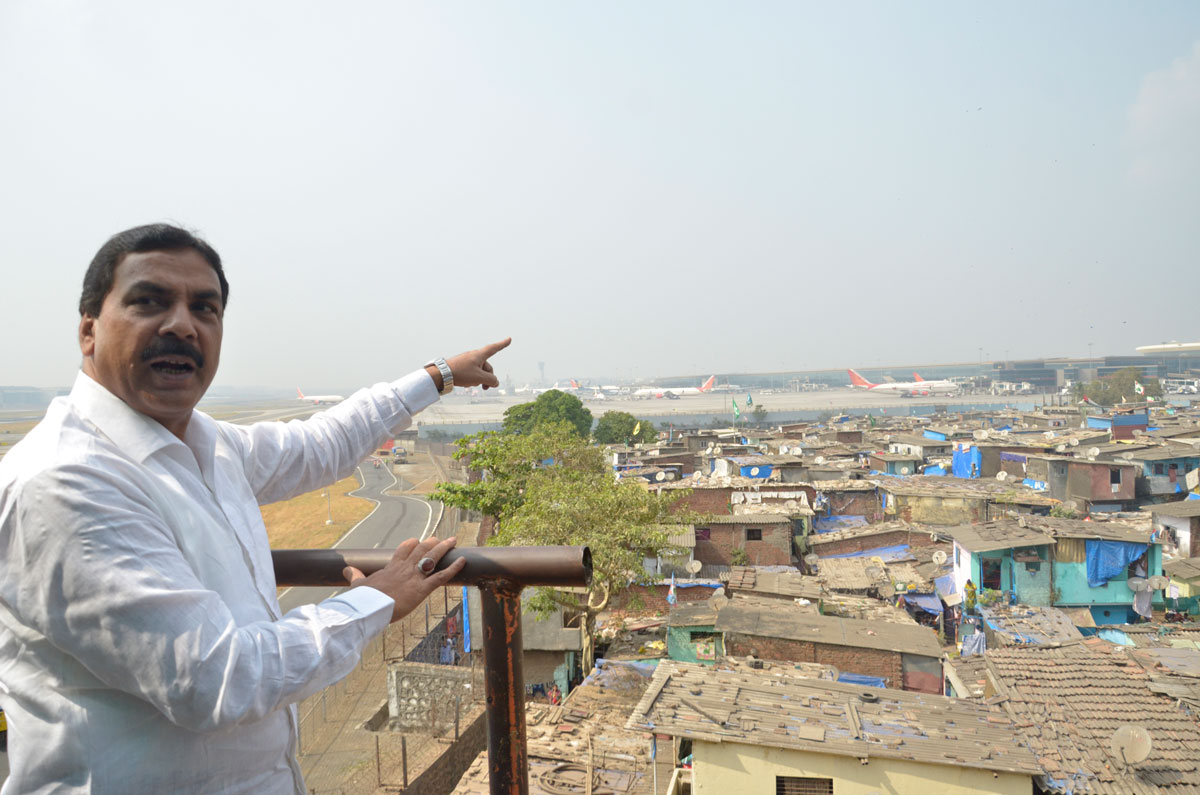Congress Leader Nasim Khan take over Airport Rehabilitation of Slum.