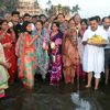 MRCC President Sanjay Nirupam & Former Speaker Of India Smt. Meera Kumar offfering Chhat Pooja at Juhu Chowpatty.